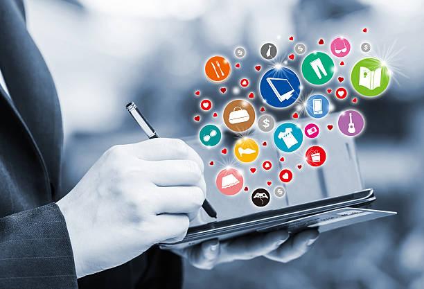 A person is working with a mobile device on advertising