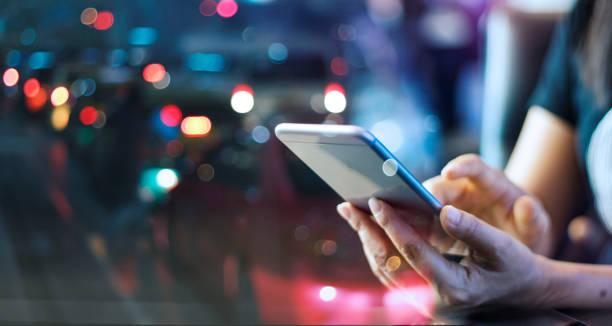 A person is holding a mobile phone